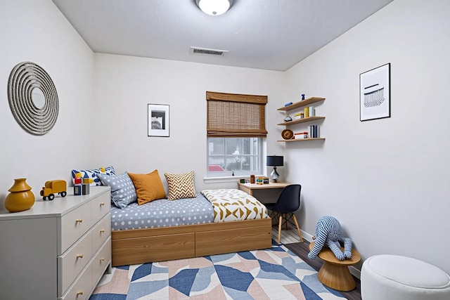 903 Sara Cir Unit 903, Port Jefferson Station, NY 11776 - bedroom with baseboards and wood finished floors