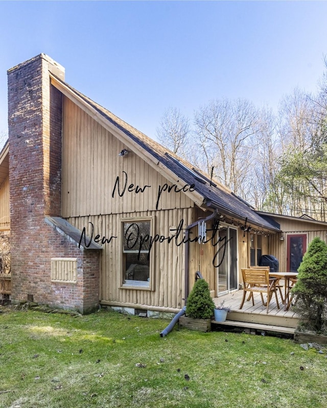 79 Torre Rock Rd, Red Hook, NY 12571 - rear view of property with a wooden deck, a yard, and a chimney