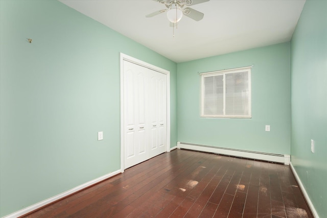 720 W Park Ave, Long Beach, NY 11561 - unfurnished bedroom featuring a closet, a baseboard heating unit, baseboards, a ceiling fan, and hardwood / wood-style flooring