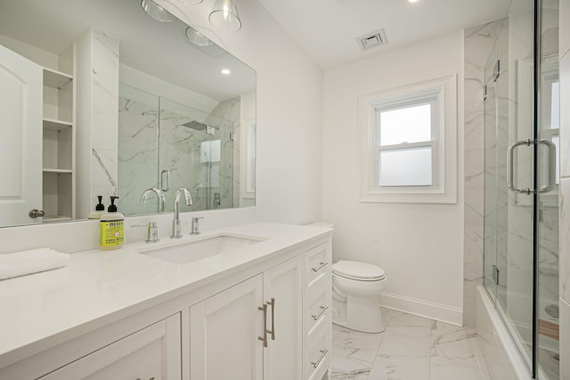 full bath featuring vanity, a marble finish shower, toilet, baseboards, and marble finish floor