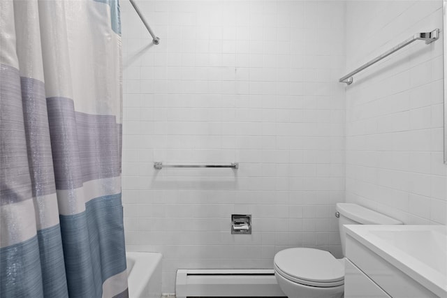 bathroom with a baseboard heating unit, toilet, vanity, and tile walls
