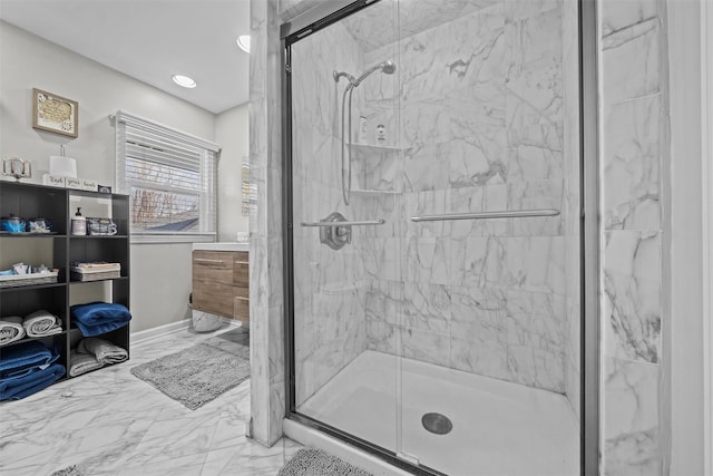 full bath with marble finish floor, a marble finish shower, vanity, and recessed lighting