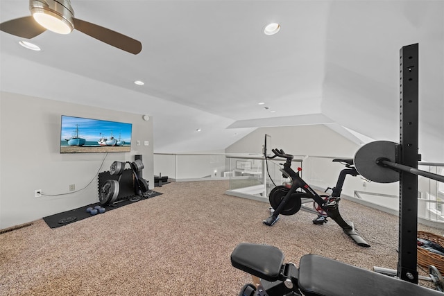 exercise area featuring recessed lighting, a ceiling fan, carpet, and vaulted ceiling