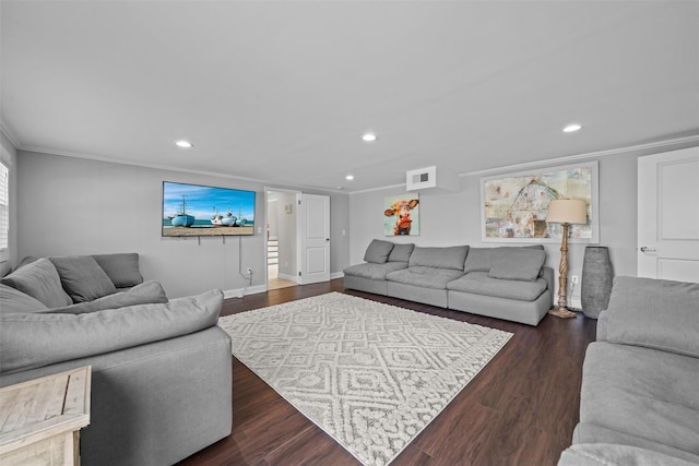 living area with ornamental molding, recessed lighting, visible vents, and dark wood finished floors