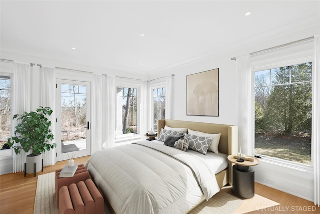 25 Fresh Pond Rd, North Haven, NY 11963 - bedroom with recessed lighting, light wood-style floors, ornamental molding, and access to outside