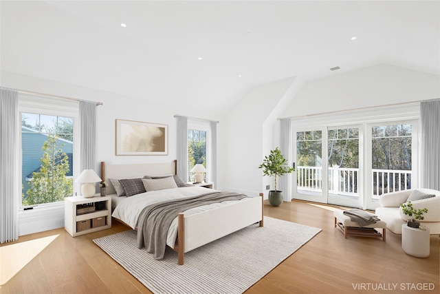 25 Fresh Pond Rd, North Haven, NY 11963 - bedroom featuring access to exterior, light wood-style floors, lofted ceiling, and recessed lighting
