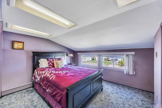 bedroom with carpet floors, baseboards, and vaulted ceiling