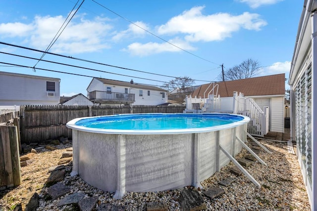 view of pool featuring a fenced in pool and a fenced backyard