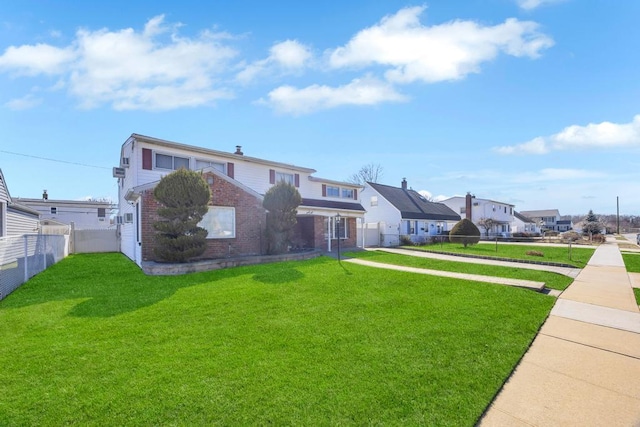 38 Cliff Ln, Levittown, NY 11756 - traditional-style home featuring brick siding and a residential view