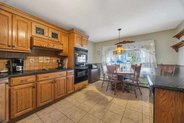 38 Cliff Ln, Levittown, NY 11756 - kitchen featuring black appliances, custom range hood, light tile patterned flooring, and brown cabinetry