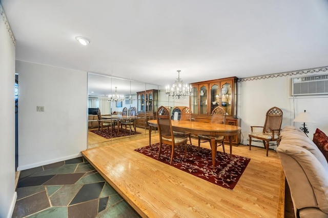 38 Cliff Ln, Levittown, NY 11756 - dining space with a chandelier, a wall mounted air conditioner, and baseboards