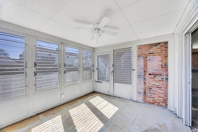 38 Cliff Ln, Levittown, NY 11756 - unfurnished sunroom featuring ceiling fan and french doors