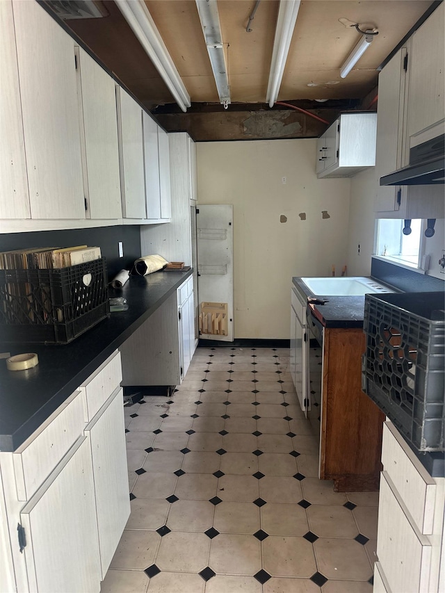 122 Finucane Pl, Woodmere, NY 11598 - kitchen featuring dark countertops