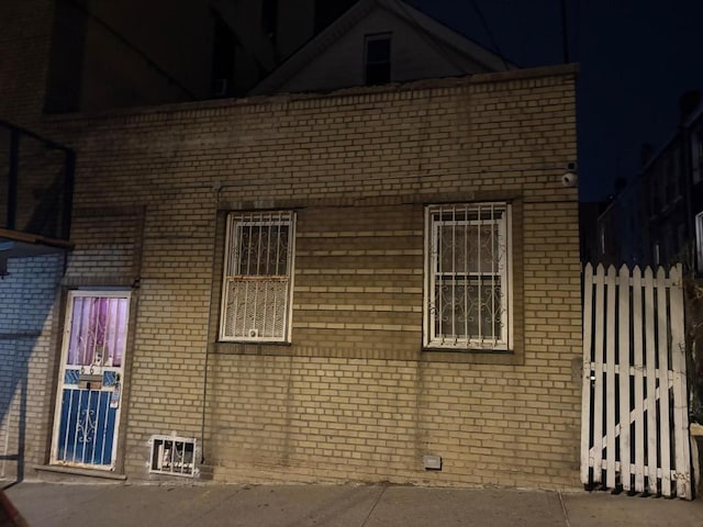 661 E 228th St, Bronx, NY 10466 - view of home's exterior with fence and brick siding