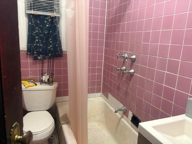 661 E 228th St, Bronx, NY 10466 - full bathroom with tile walls, a sink, and toilet