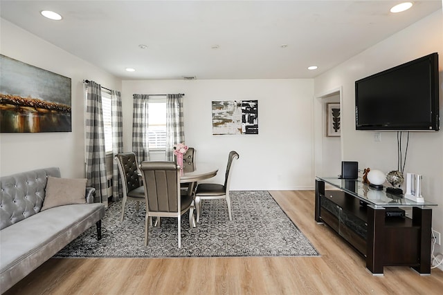 dining area with recessed lighting and light wood-type flooring