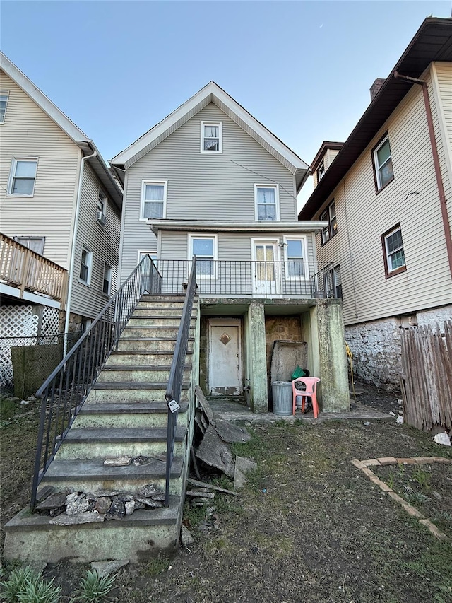 39 Rathbun Ave, White Plains, NY 10606 - back of property with stairs and a wooden deck