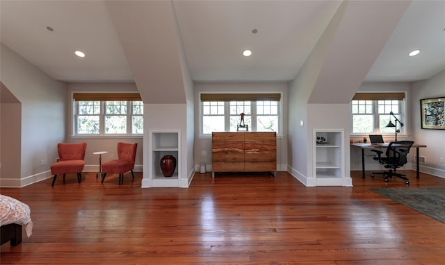 interior space with recessed lighting, baseboards, and hardwood / wood-style floors