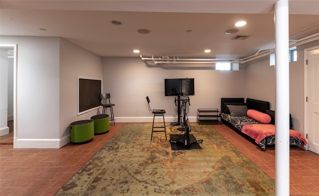 living area with visible vents, recessed lighting, baseboards, and tile patterned flooring
