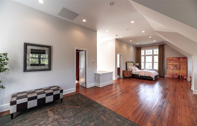 bedroom featuring wood-type flooring, recessed lighting, baseboards, vaulted ceiling, and visible vents