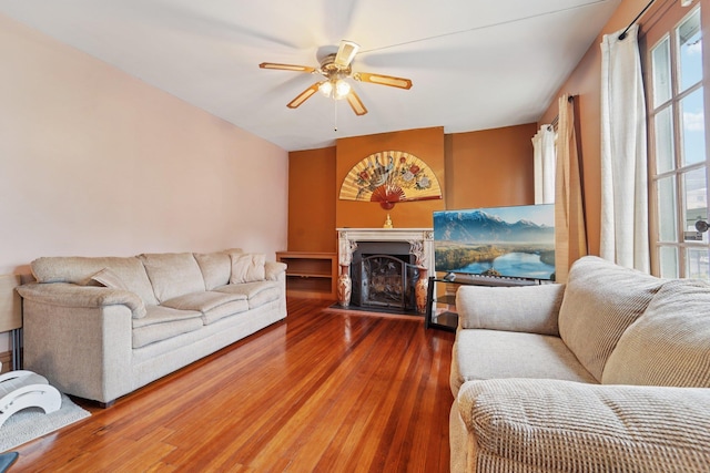 227 Valentine Ln, Yonkers, NY 10705 - living room with plenty of natural light, wood finished floors, ceiling fan, and a fireplace