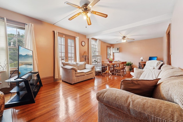 227 Valentine Ln, Yonkers, NY 10705 - living room featuring ceiling fan, healthy amount of natural light, light wood-style flooring, and an AC wall unit