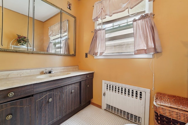 227 Valentine Ln, Yonkers, NY 10705 - bathroom with radiator heating unit and vanity
