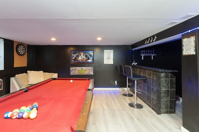recreation room featuring wood finished floors, billiards, baseboards, a dry bar, and recessed lighting