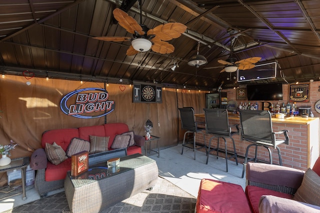 view of patio / terrace with outdoor lounge area, outdoor dry bar, and a ceiling fan
