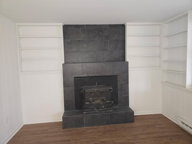 51 Glenerie Ln, Saugerties, NY 12477 - detailed view of a baseboard heating unit, wood finished floors, built in features, and baseboards