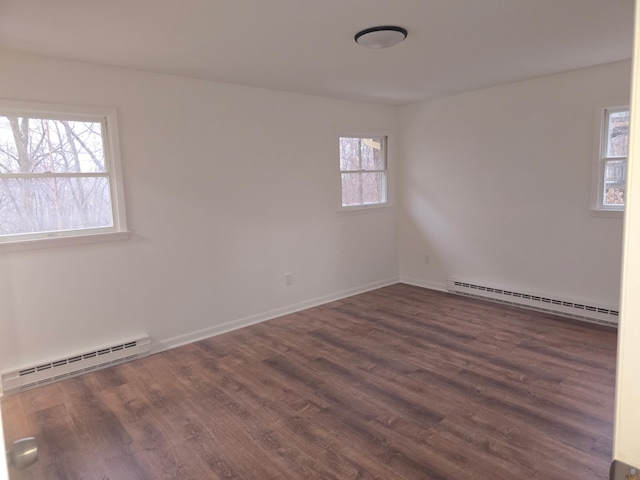 51 Glenerie Ln, Saugerties, NY 12477 - unfurnished room featuring baseboard heating, a baseboard radiator, dark wood-style flooring, and baseboards