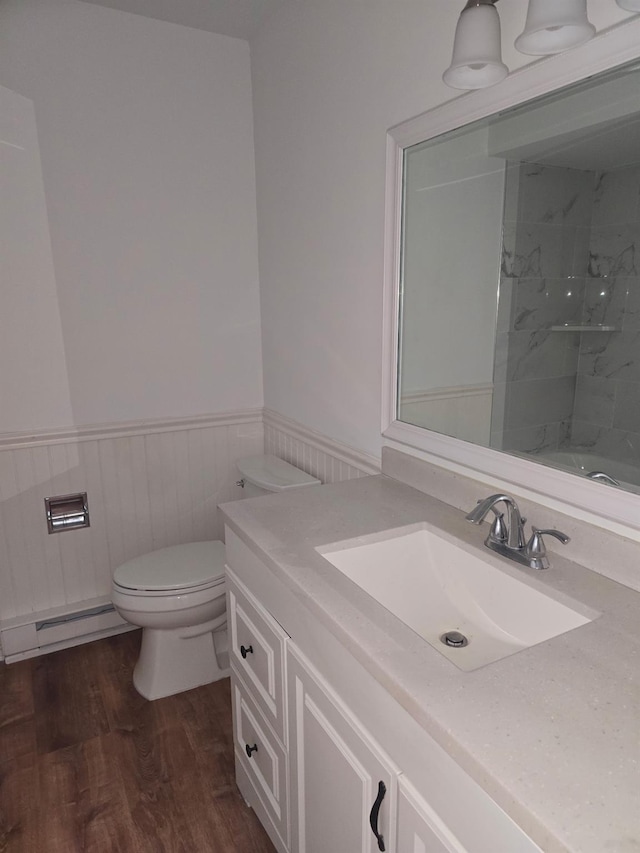 51 Glenerie Ln, Saugerties, NY 12477 - bathroom with toilet, a wainscoted wall, vanity, a shower, and wood finished floors