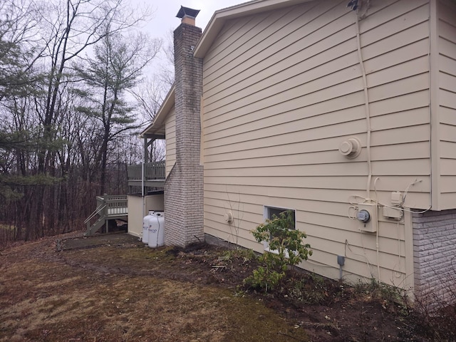 51 Glenerie Ln, Saugerties, NY 12477 - view of property exterior with a chimney