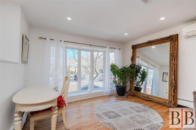 2394 National Dr, Brooklyn, NY 11234 - interior space featuring recessed lighting, an AC wall unit, and wood finished floors