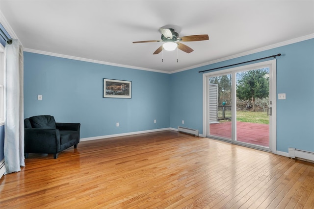 24 Patricia Ln, Washingtonville, NY 10992 - interior space featuring baseboard heating, crown molding, light wood-style floors, and ceiling fan