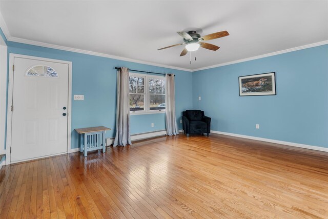 24 Patricia Ln, Washingtonville, NY 10992 - unfurnished room featuring a baseboard radiator, light wood-type flooring, ceiling fan, and ornamental molding