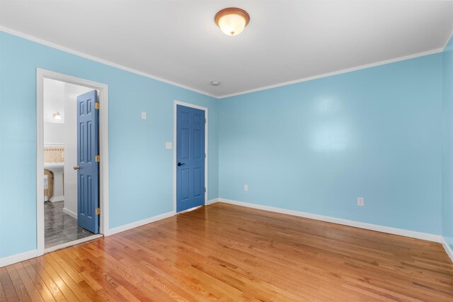 24 Patricia Ln, Washingtonville, NY 10992 - unfurnished bedroom with hardwood / wood-style floors, ornamental molding, and baseboards