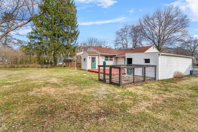 24 Patricia Ln, Washingtonville, NY 10992 - rear view of property with a lawn, an outbuilding, and fence