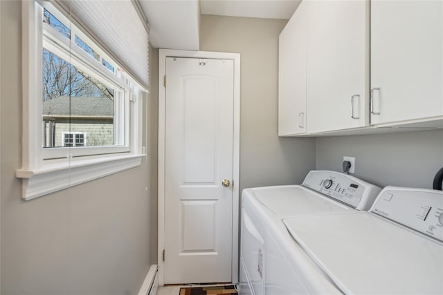 laundry room featuring cabinet space and independent washer and dryer