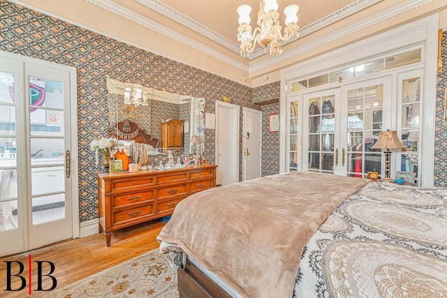22 4th Pl, Brooklyn, NY 11231 - bedroom featuring access to exterior, light wood-type flooring, wallpapered walls, ornamental molding, and an inviting chandelier
