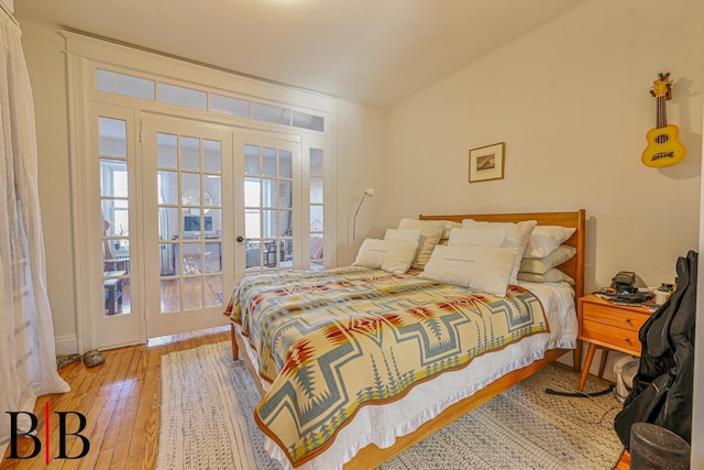 22 4th Pl, Brooklyn, NY 11231 - bedroom featuring lofted ceiling, french doors, and wood-type flooring