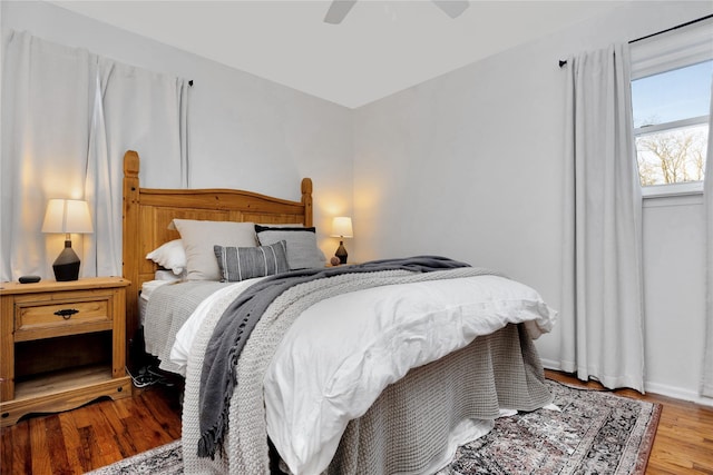 bedroom featuring a ceiling fan and light wood-style flooring