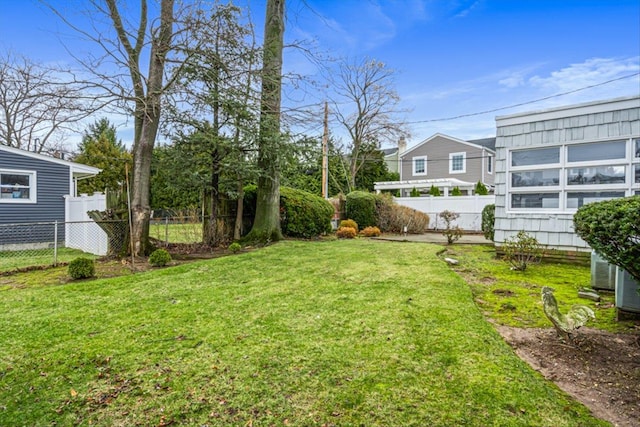 view of yard with fence