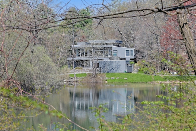 exterior space with a forest view