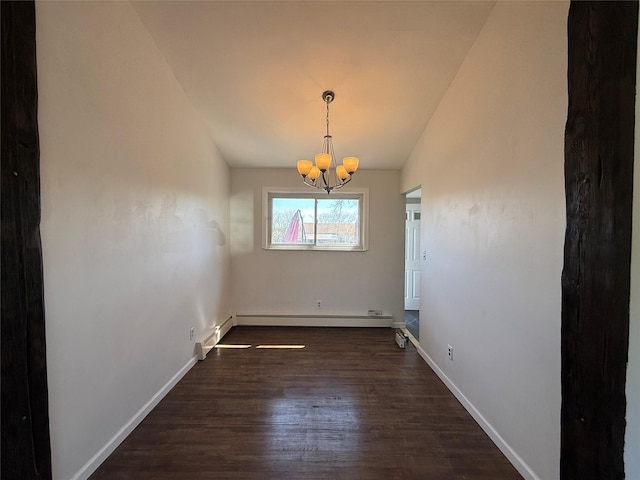 unfurnished dining area featuring lofted ceiling, dark wood-type flooring, baseboards, a baseboard radiator, and a notable chandelier