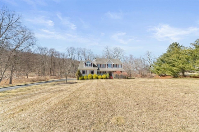 view of front of home featuring a front lawn