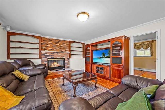 5 Peterson Rd, Monroe, NY 10950 - living area with a baseboard radiator, crown molding, wood finished floors, and a fireplace