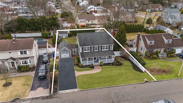 drone / aerial view with a residential view