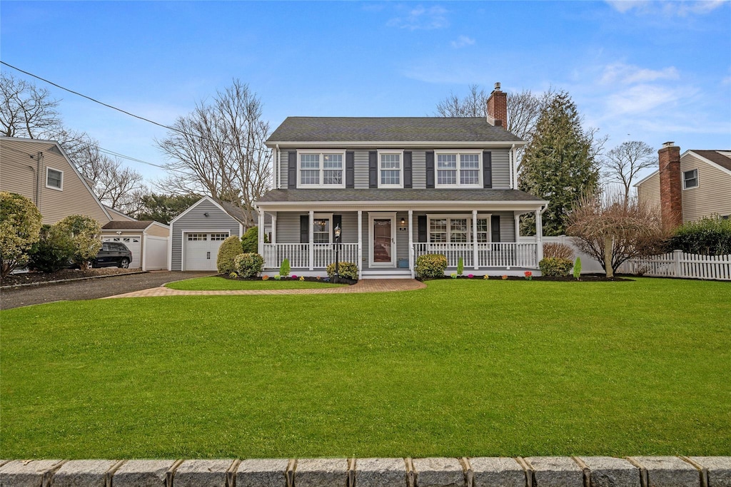 316 George St, West Islip, NY 11795 - colonial inspired home featuring a porch, driveway, an outdoor structure, a garage, and a chimney