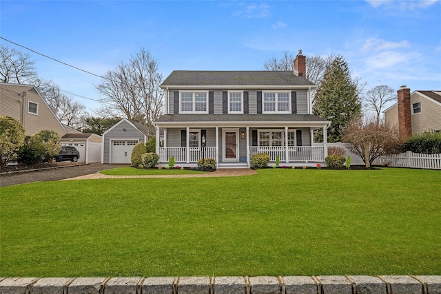 316 George St, West Islip, NY 11795 - colonial inspired home featuring a porch, driveway, an outdoor structure, a garage, and a chimney
